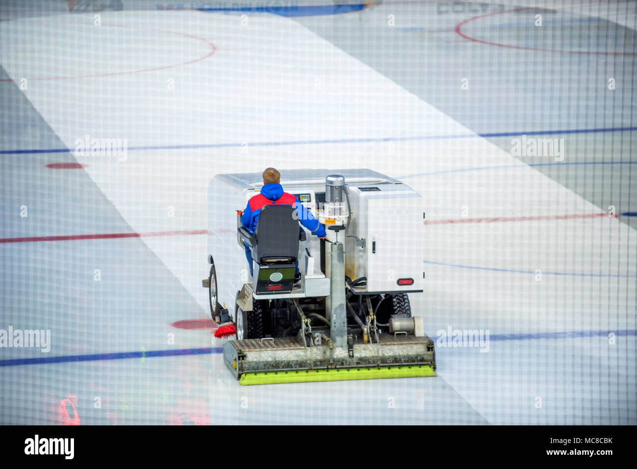 Resurfacing machine cleaning ice of hockey rink Stock Photo Alamy