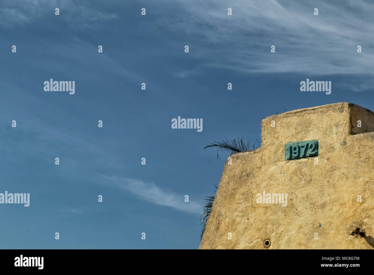 ancient water source in africa angola, with year represented. 1972 Stock Photo Alamy