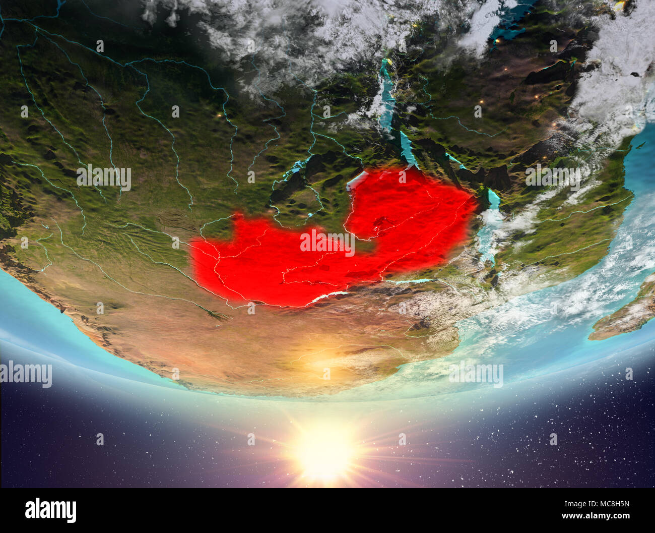 Zambia during sunrise highlighted in red on planet Earth with clouds ...