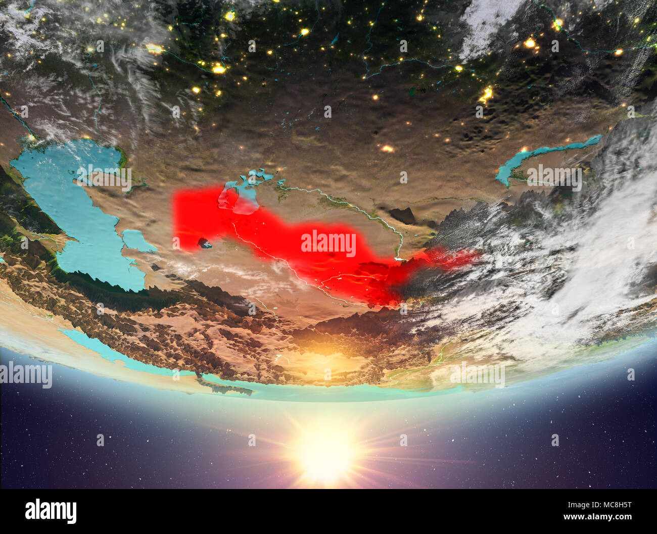 Uzbekistan during sunrise highlighted in red on planet Earth with ...