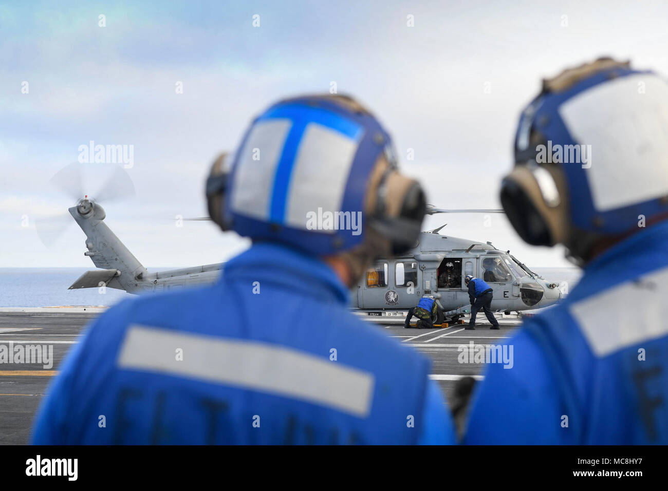 US Navy aircraft carrier, flight deck crew at work Stock Photo Alamy