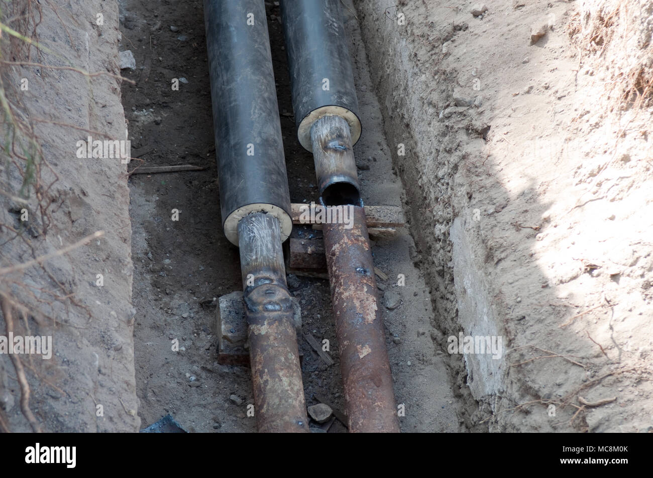 Replacing old heating systems and water pipes to new Stock Photo Alamy