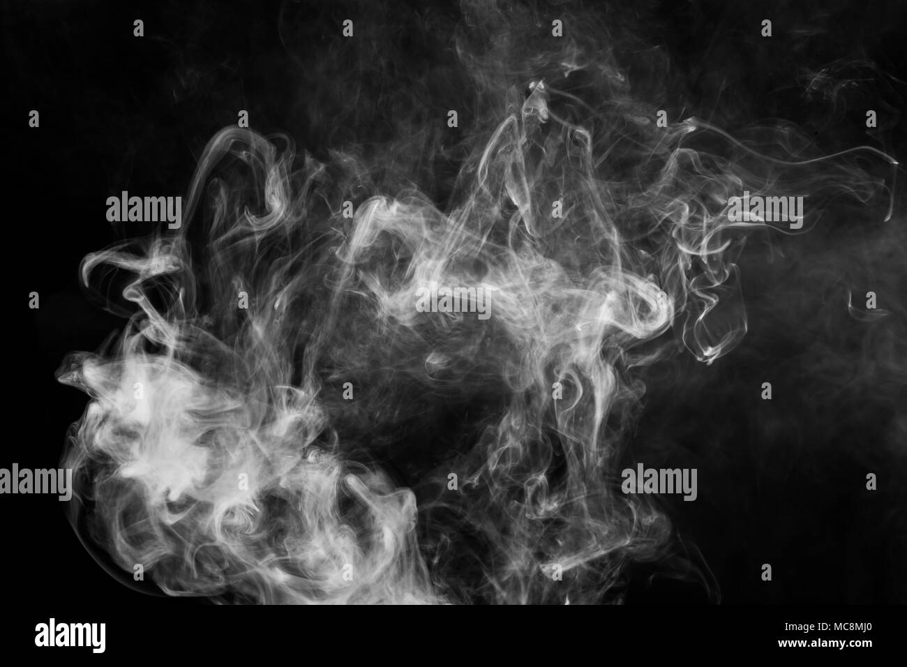 White cloud smoke on black isolated background Stock Photo - Alamy