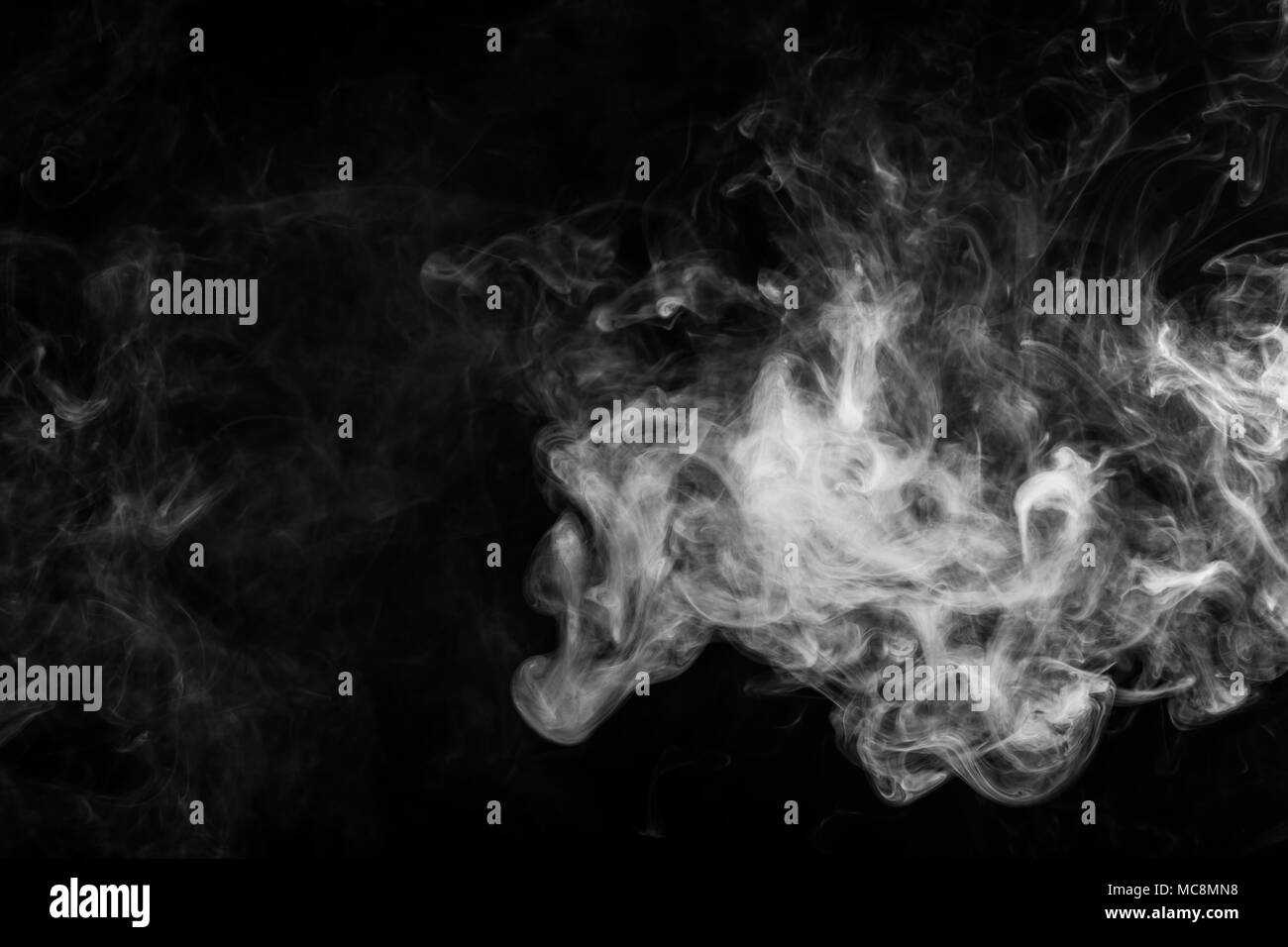 White smoke on black background Stock Photo - Alamy