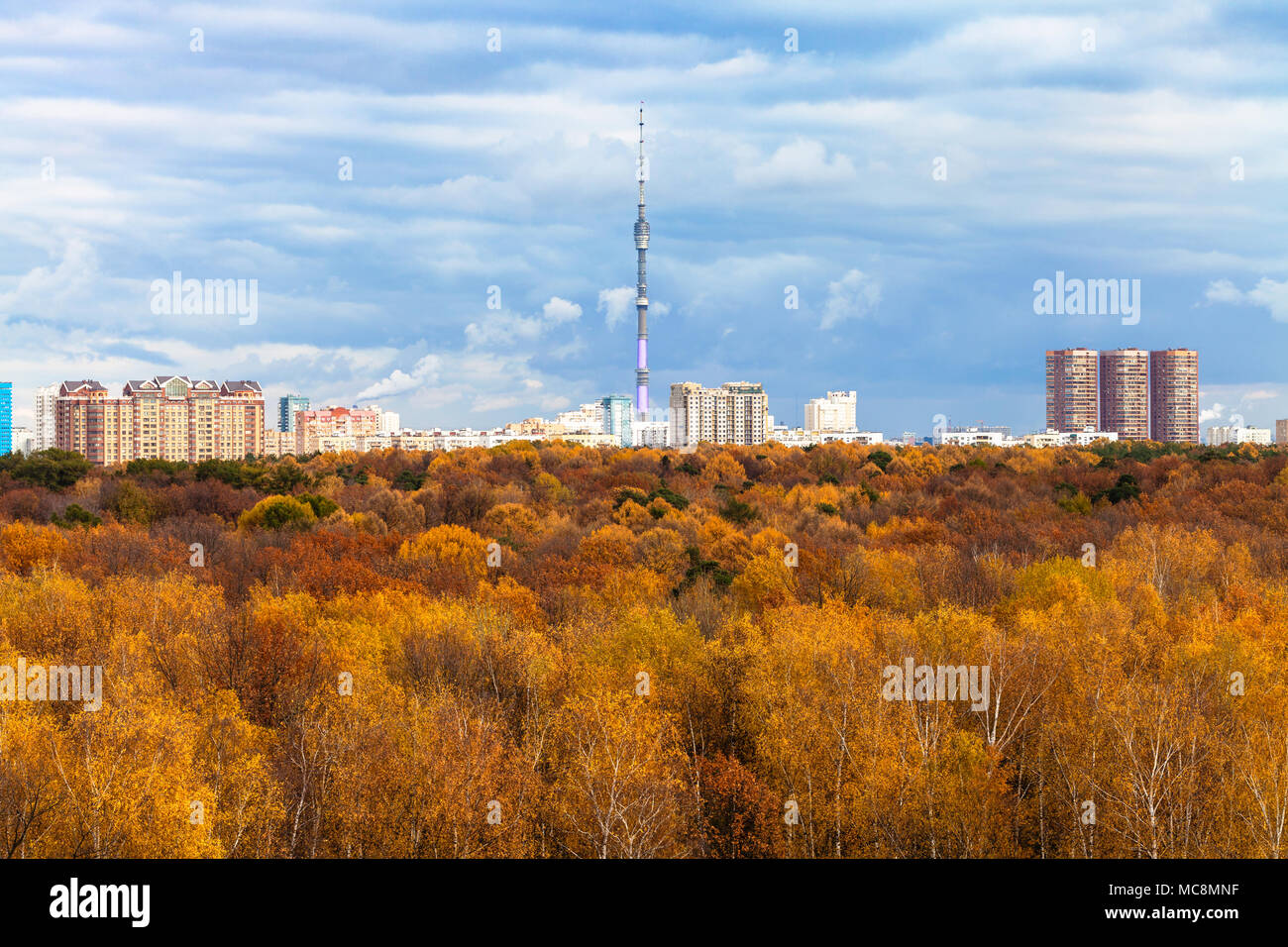 above view of urban Timiryazevskiy park and Ostankinskaya TV tower in ...