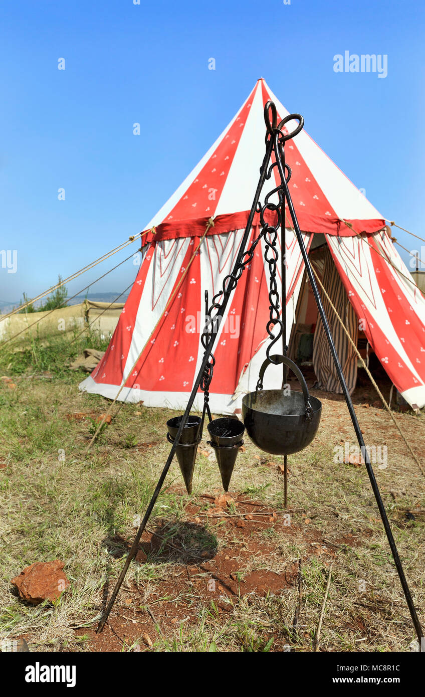 Bins for food on the background of a tent at a medieval festival Stock Photo