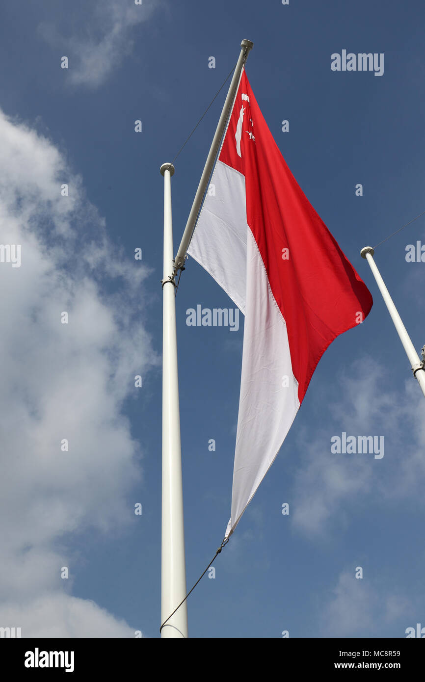 The flag of Singapore flies with other flags from countries of the Commonwealth in Parliament Square, central London, ahead of Commonwealth Heads of Government Meeting (CHOGM) on Monday. Stock Photo