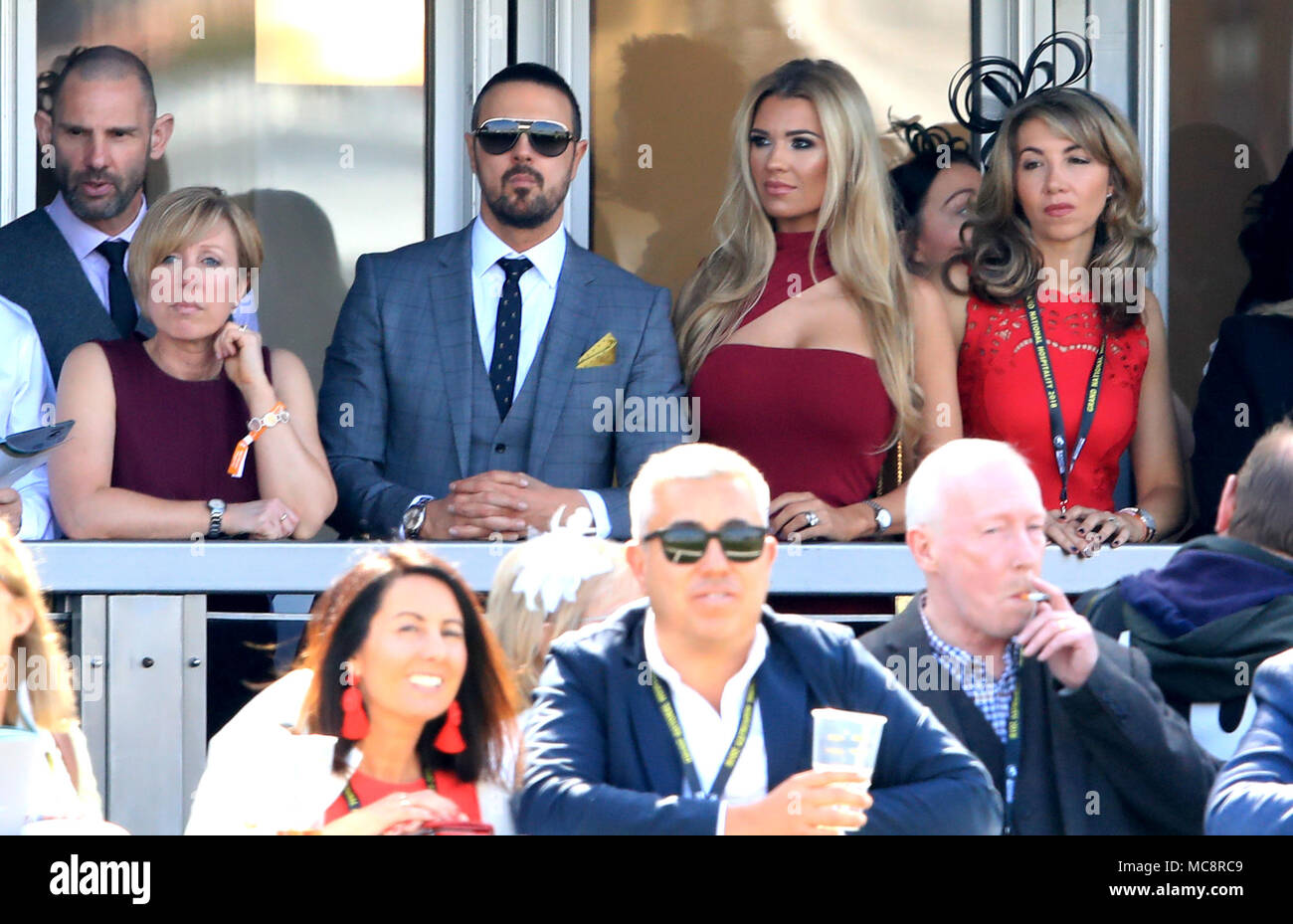 Paddy McGuinness and his wife Christine McGuinness watch the action during Grand National Day of the 2018 Randox Health Grand National Festival at Aintree Racecourse, Liverpool. Stock Photo