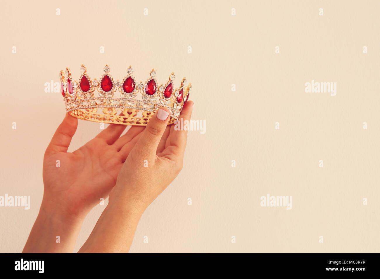 queen and smiling king with crowns holding hands isolated on grey Stock  Photo - Alamy