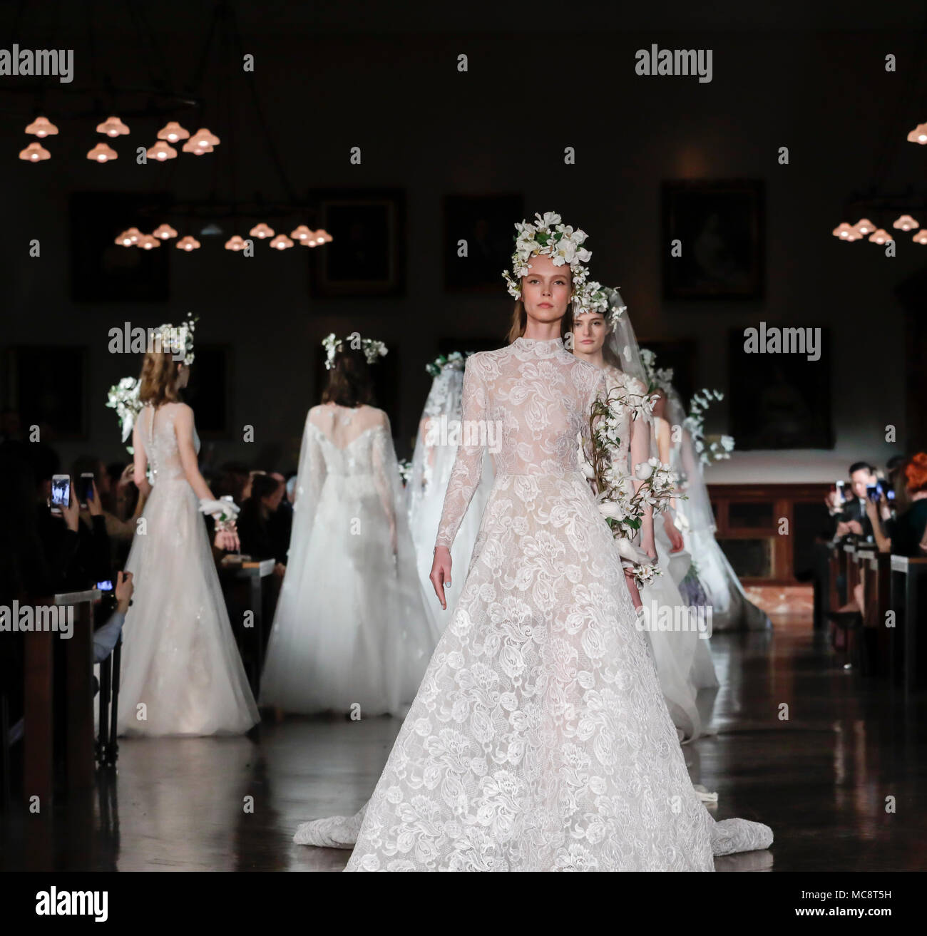 New York, NY, USA - April 12, 2018: Models walk runway for Reem Acra Bridal Spring/Summer 2019 collection during NY Bridal Wweek at NY Public Library, Stock Photo
