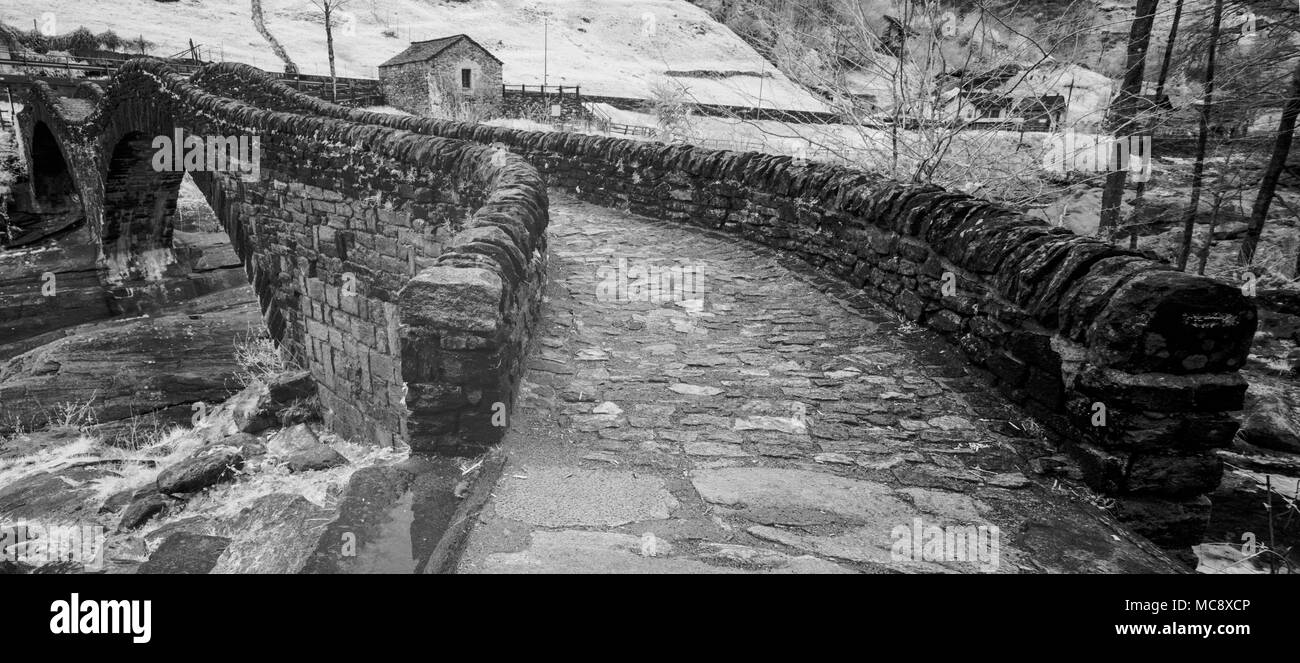 black and white close up view of historic stone bridge from Roman times ...