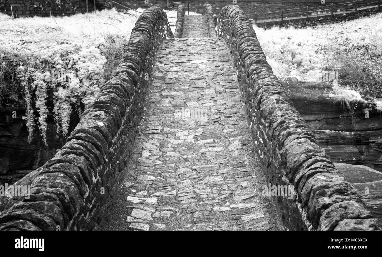 Old stone bridge two arches Black and White Stock Photos & Images - Alamy