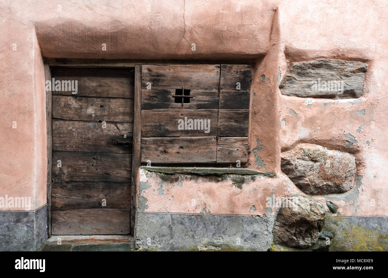 old wooden door in a stone house Stock Photo - Alamy