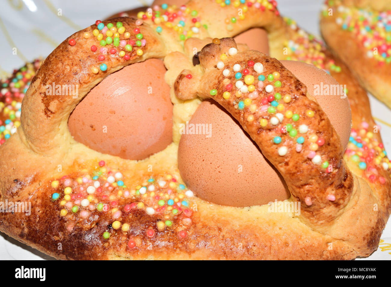 Traditional Sicilian Easter cookies with eggs named cuddure Stock Photo