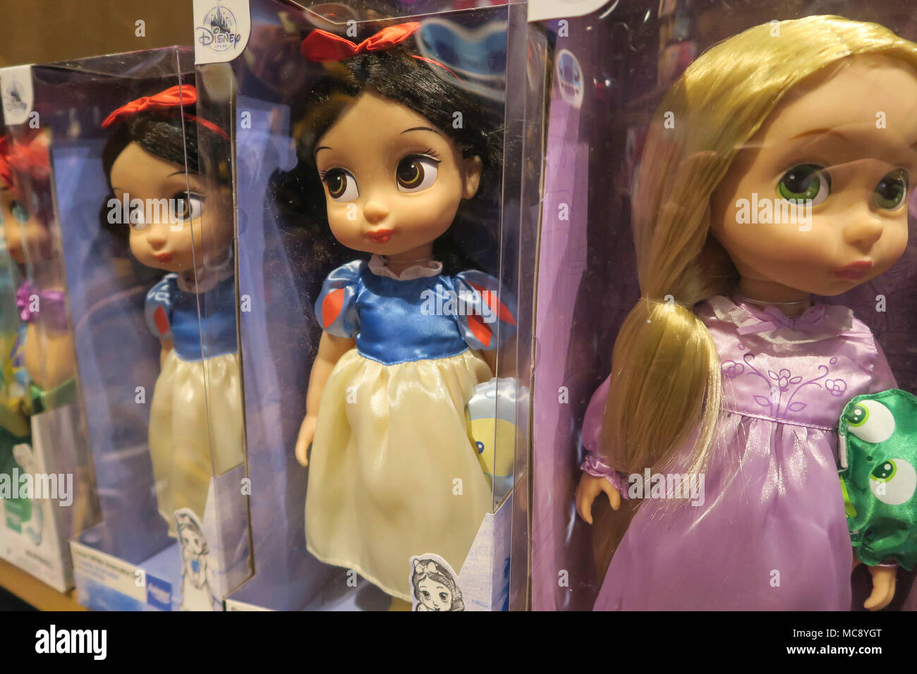 Disney Animators' Collection Dolls in the Disney Store in Times Square, NYC, USA Stock Photo