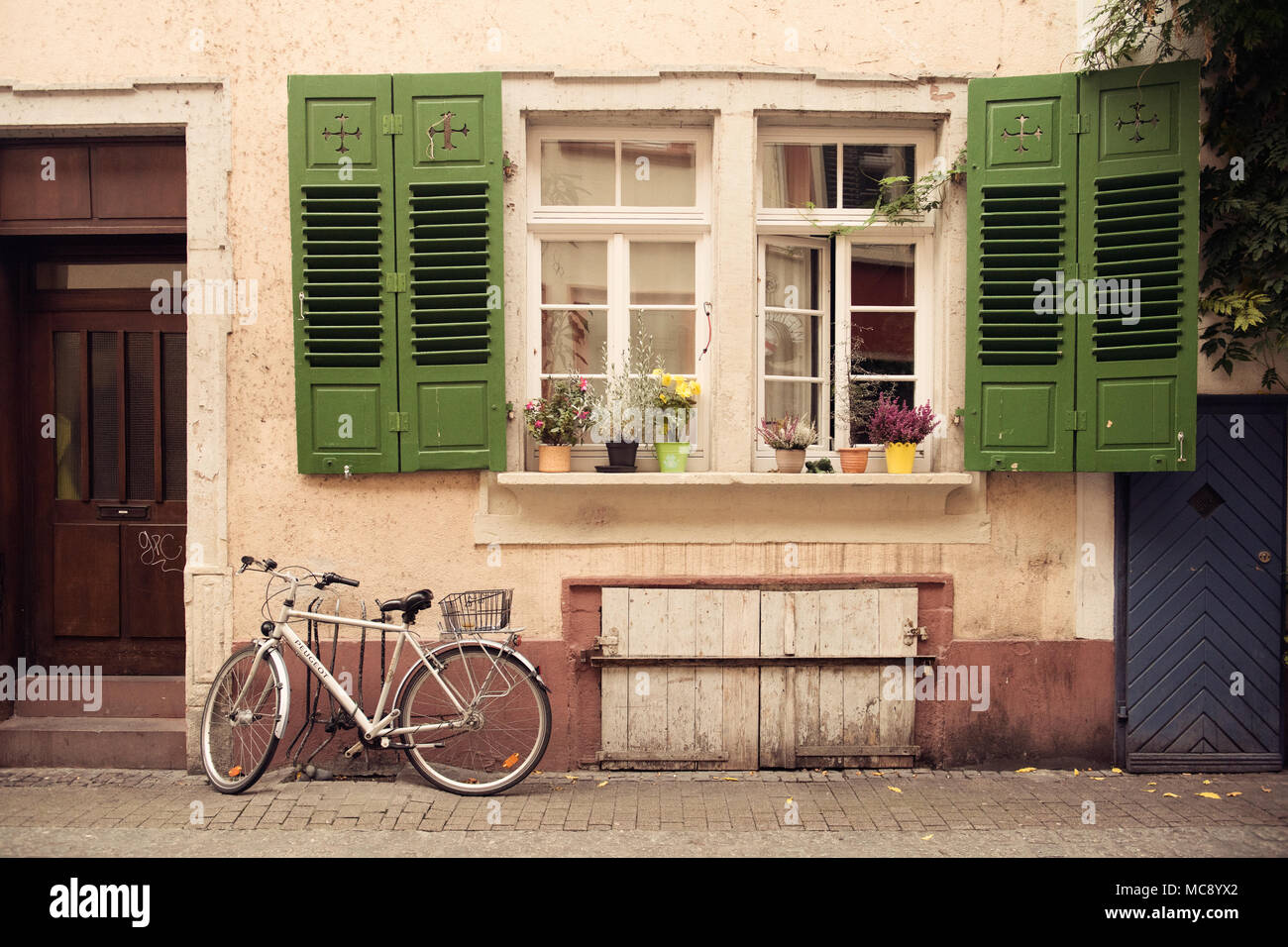 Wooden window with bicycle,Heidelberg,Germany Stock Photo