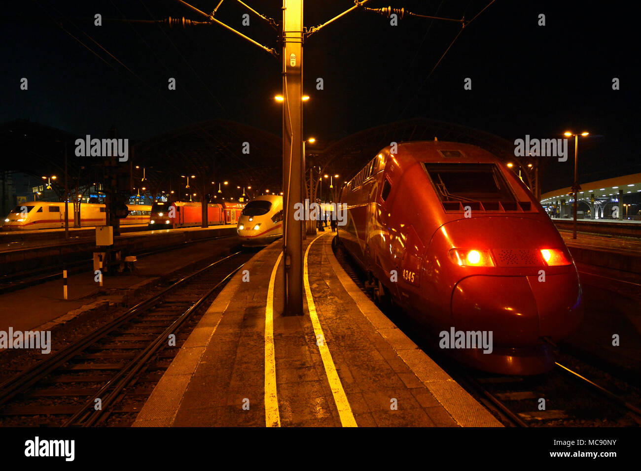 Thalys, ICE and other trains at Cologne railway station in Germany ...
