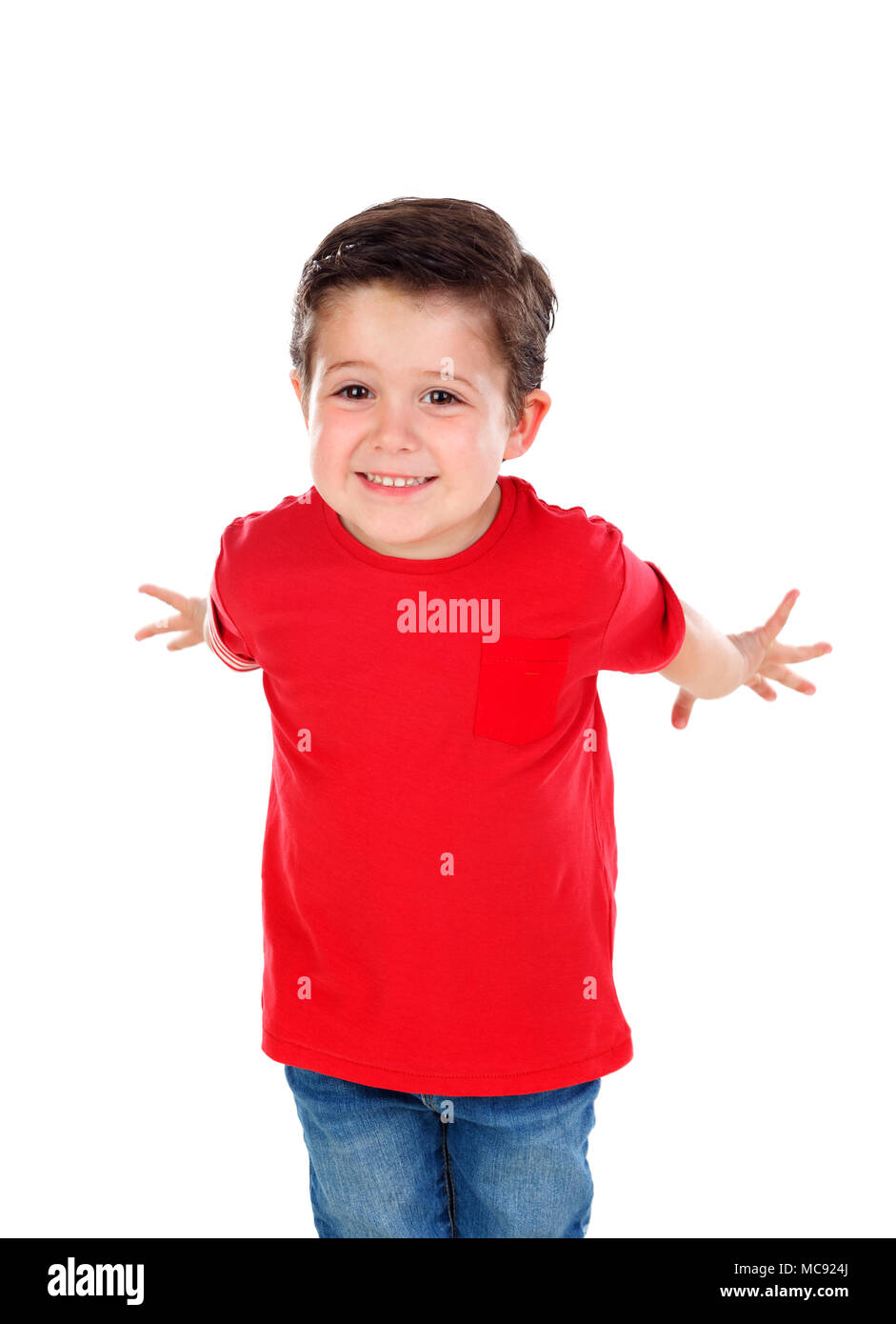 Funny small child with dark hair and black eyes crossing his arms