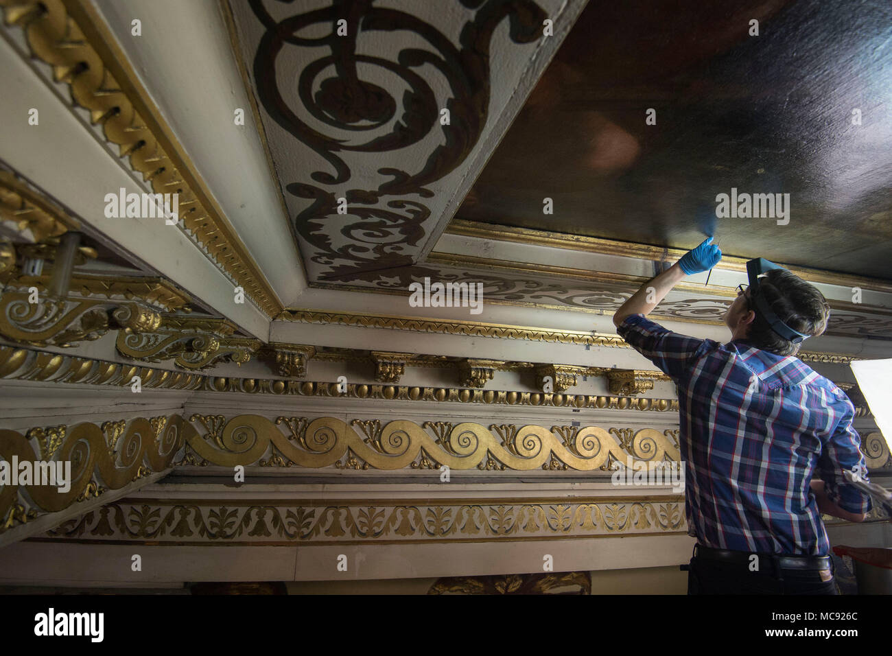 A Painting Conservator Makes Small Refreshes To The Coffering