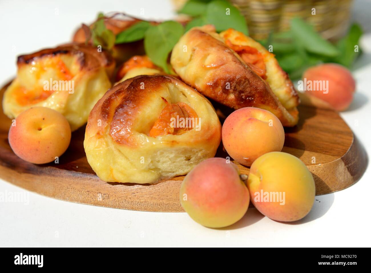 Buns made from yeast dough with apricot Stock Photo