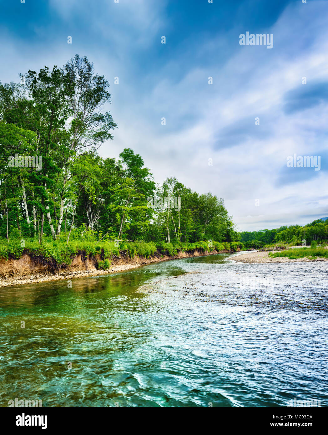 Beautiful russian landscape. Stream on the foreground. Stock Photo