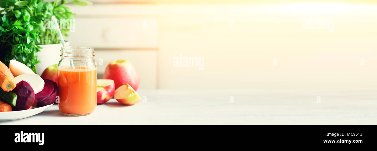 Woman Making Fresh Drink Juicer And Carrot Juice Fruits In