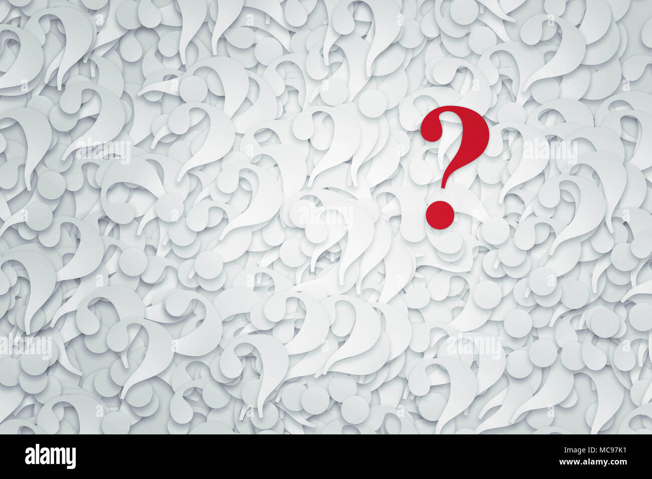 Stack of question marks and one red question mark. Stock Photo