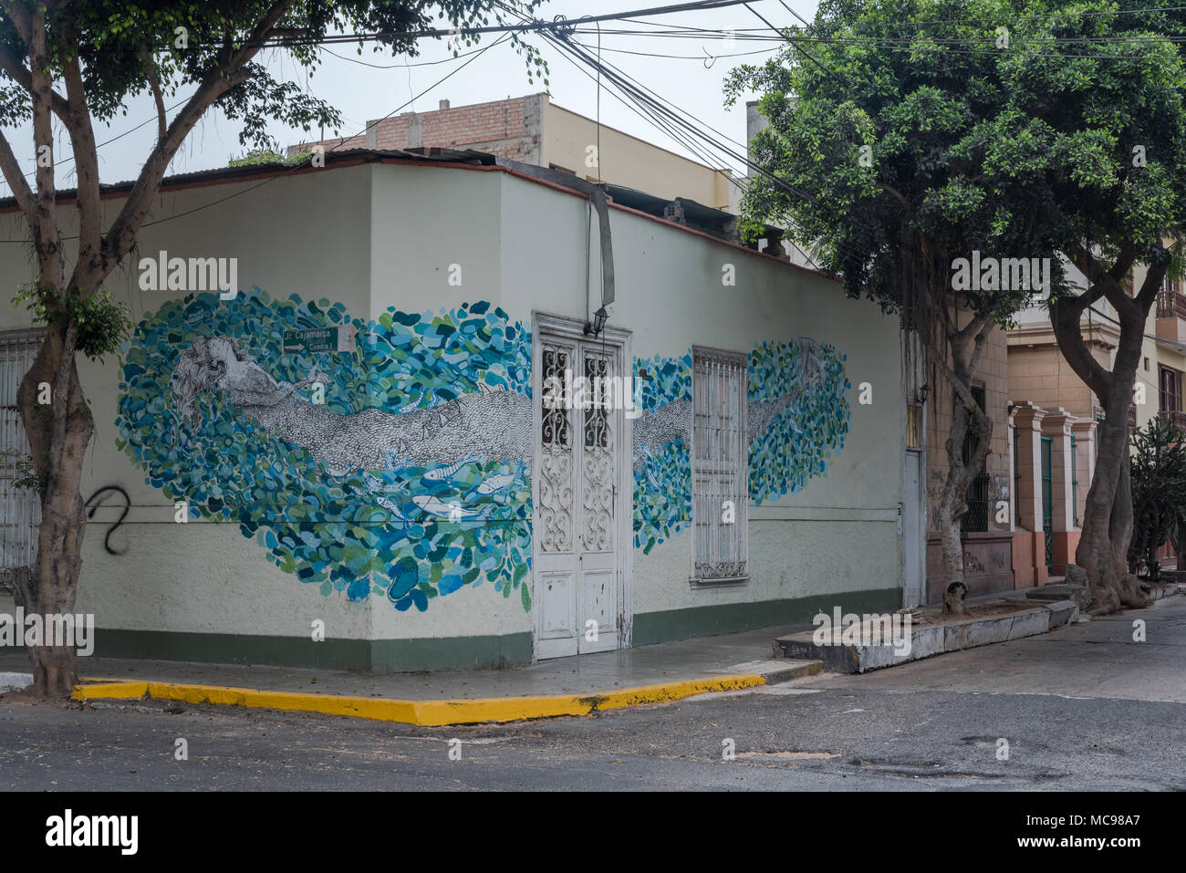 Lima, Peru -- April 13, 2018. Brightly painted house on a corner in the  Barranco District of Lima, Peru. Editorial use only. Stock Photo