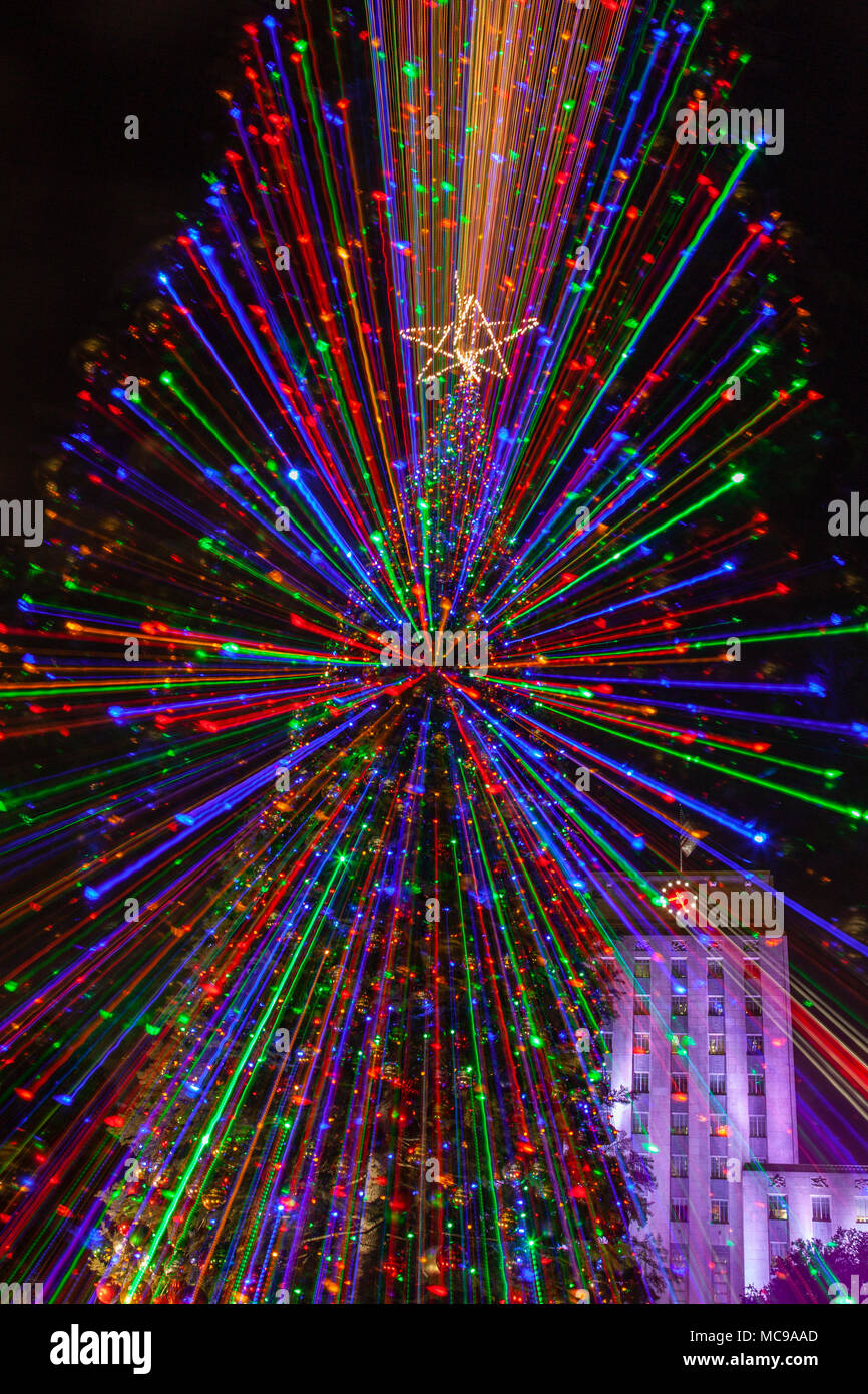 Christmas tree lights in downtown Houston by courthouse at night Stock