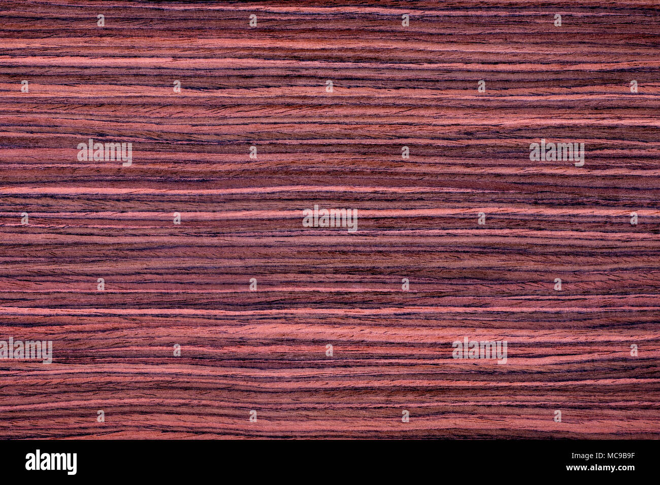 Texture of red rosewood veneer, seamless. Stock Photo