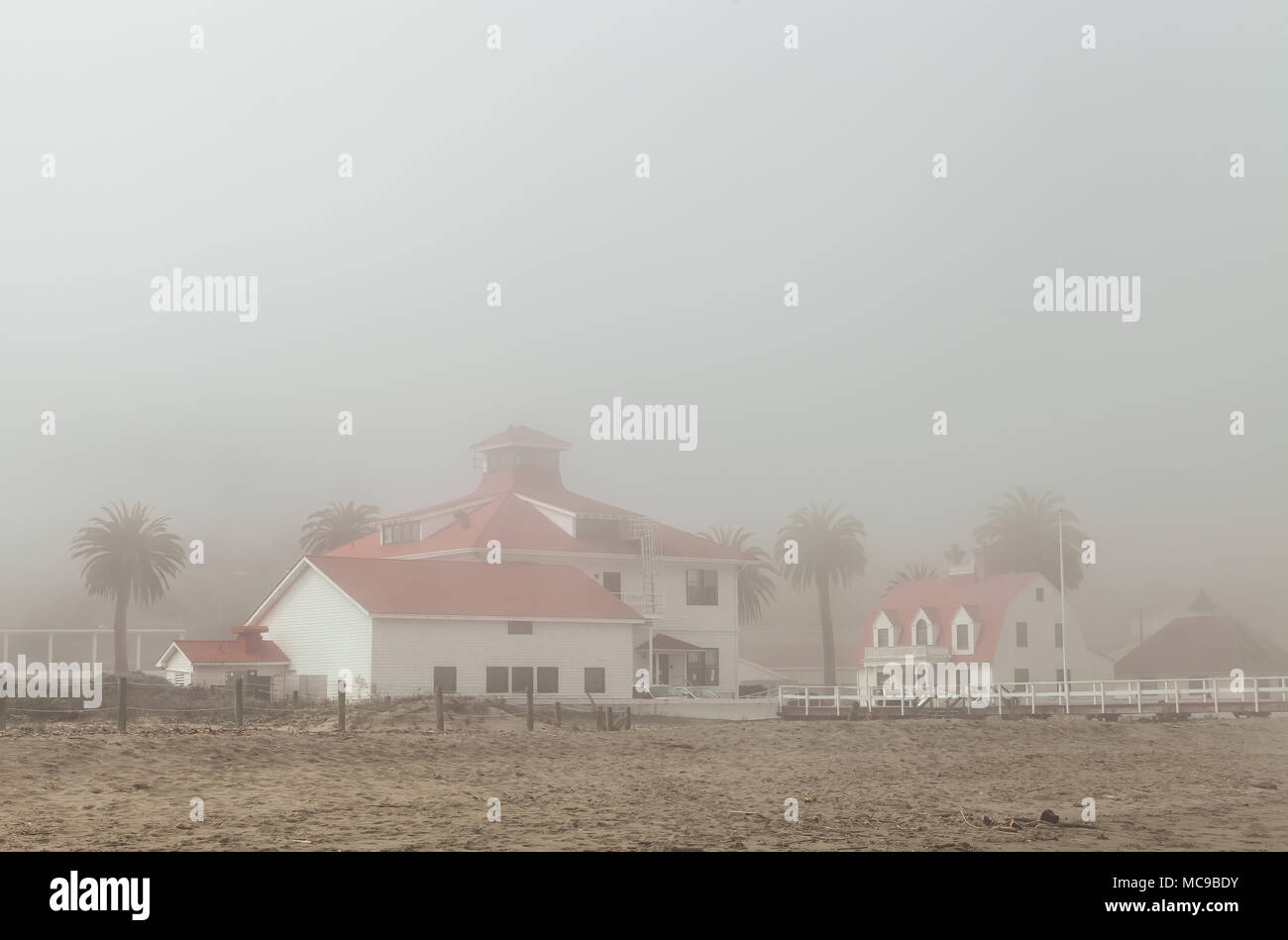 Greater Farallones National Marine Sanctuary, formerly known as U.S. Coast Guard Station and the early morning fog, Crissy Field, San Francisco, USA Stock Photo