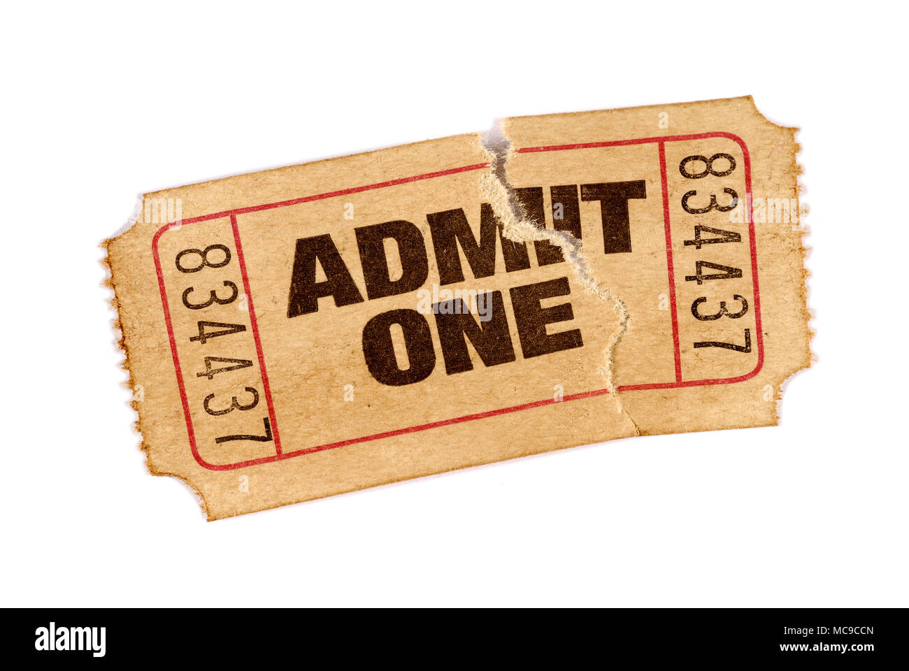 Old torn and stained admit one movie ticket Stock Photo