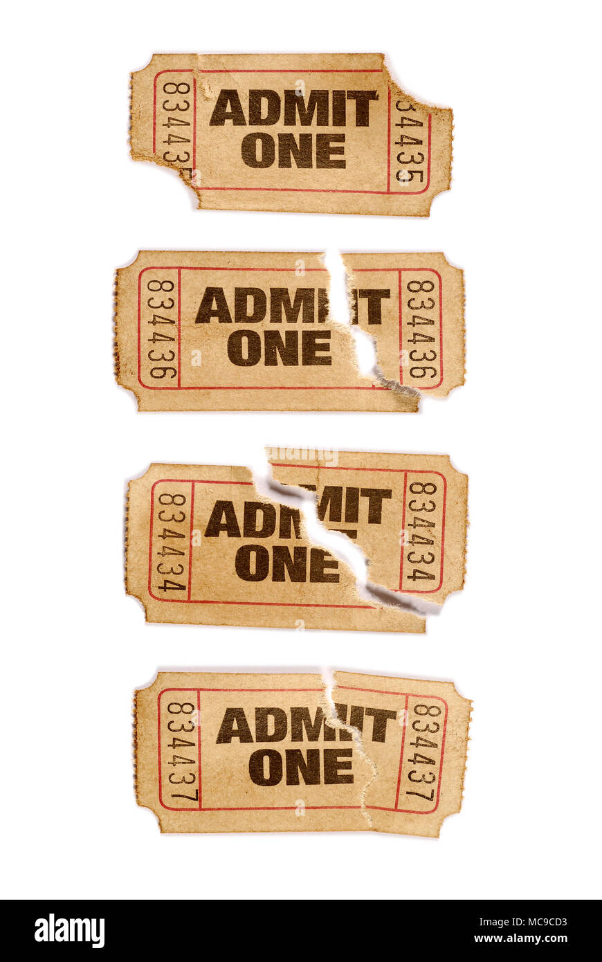 Several old torn and stained admit one movie tickets Stock Photo