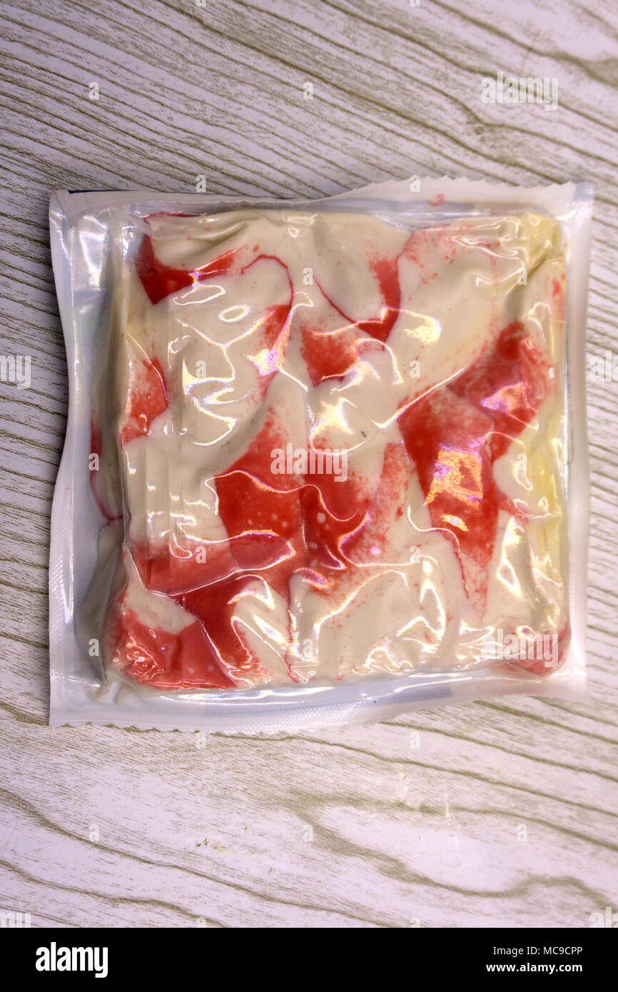 packaged frozen crab meat. Isolated over white background Stock Photo Alamy