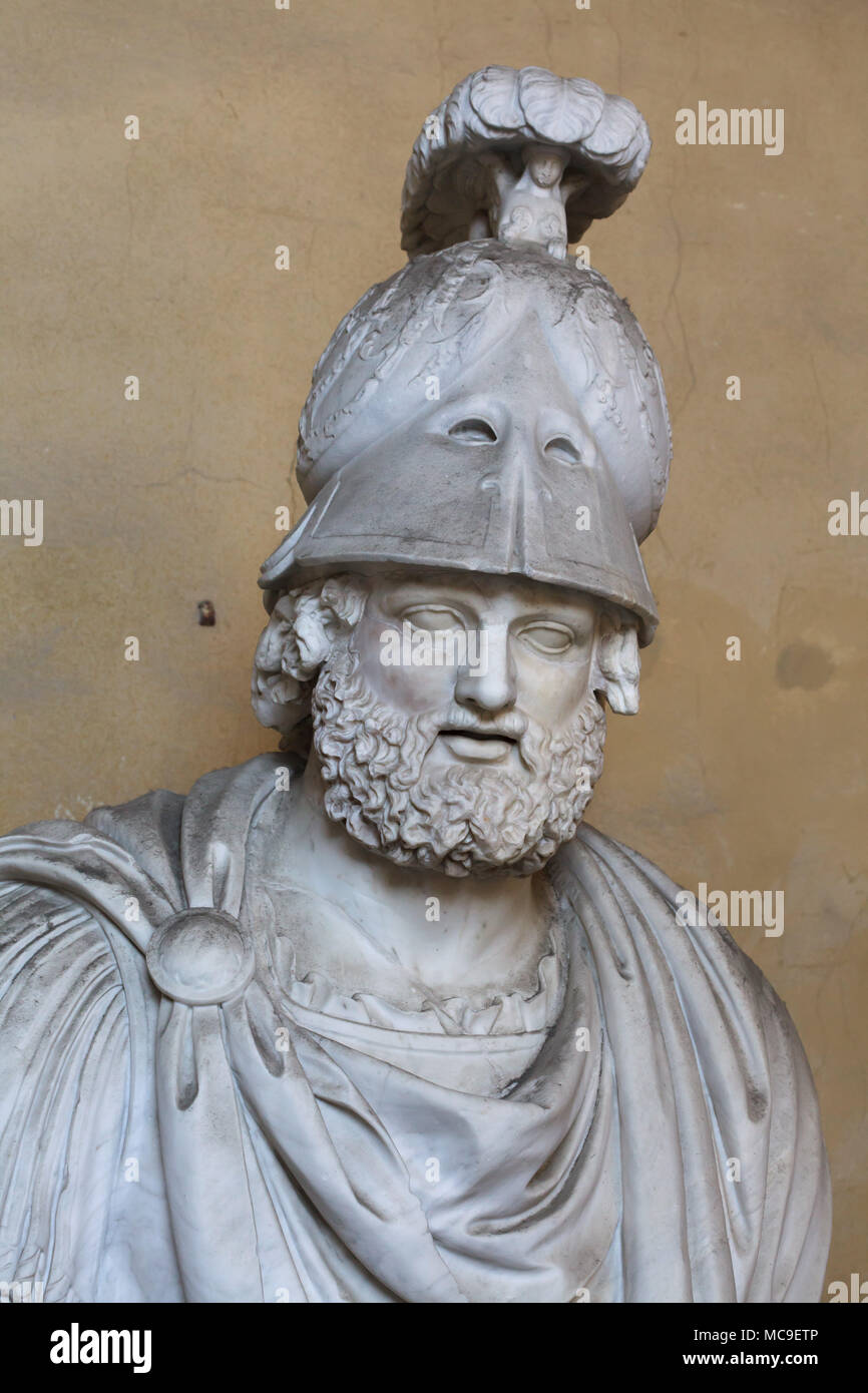 Greek general and statesman Pyrrhus of Epirus (319/318 - 272 BC). Roman marble head completed with a helmet and bust in the 16th century on display in the courtyard of the Palazzo Pitti in Florence, Tuscany, Italy. Stock Photo