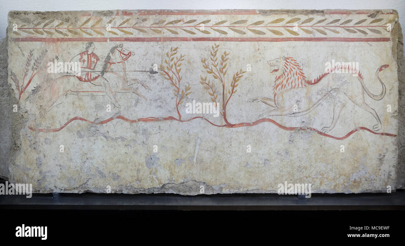 Lion hunting depicted in the Lucanian fresco from 375-350 BC from the Tomb 1 of the Arcioni Necropolis on display in the Paestum Archaeological Museum (Museo archeologico di Paestum) in Paestum, Campania, Italy. Stock Photo