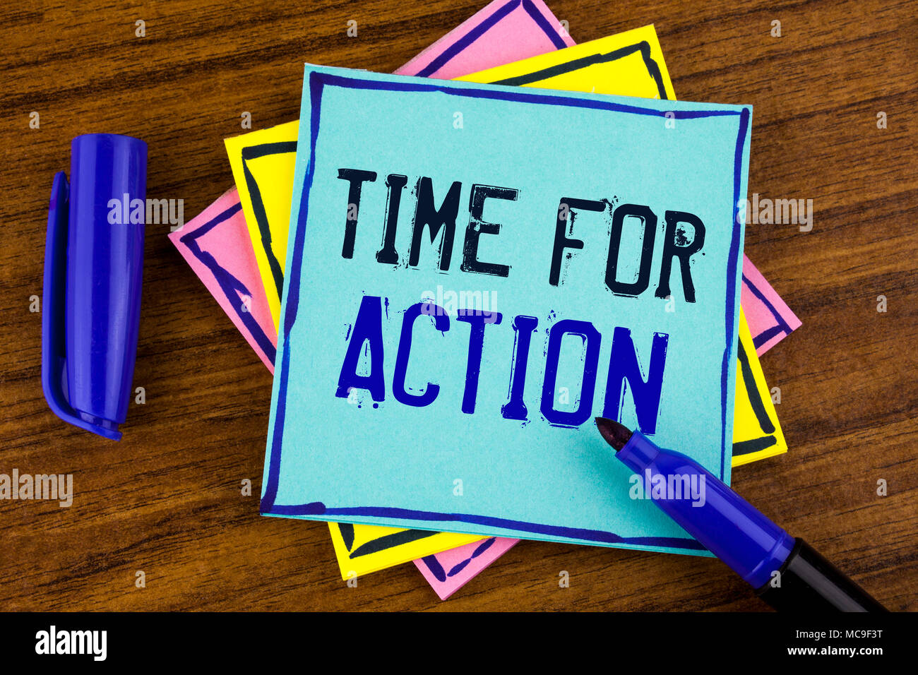 Handwriting text writing Time For Action. Concept meaning Do not sit idle  take initiative get work done duly written on Sticky note paper placed on  White Keyboard. Top view. Stock Photo