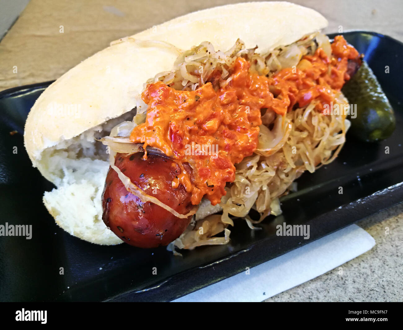 Spicy pepper giant pork German hot dog with special mustard sauce Stock