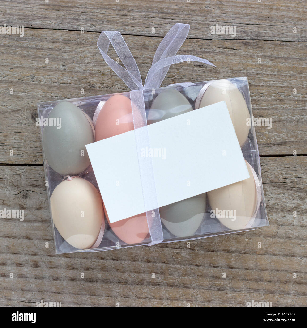 Box of pastel-colored Easter eggs and copy space Stock Photo