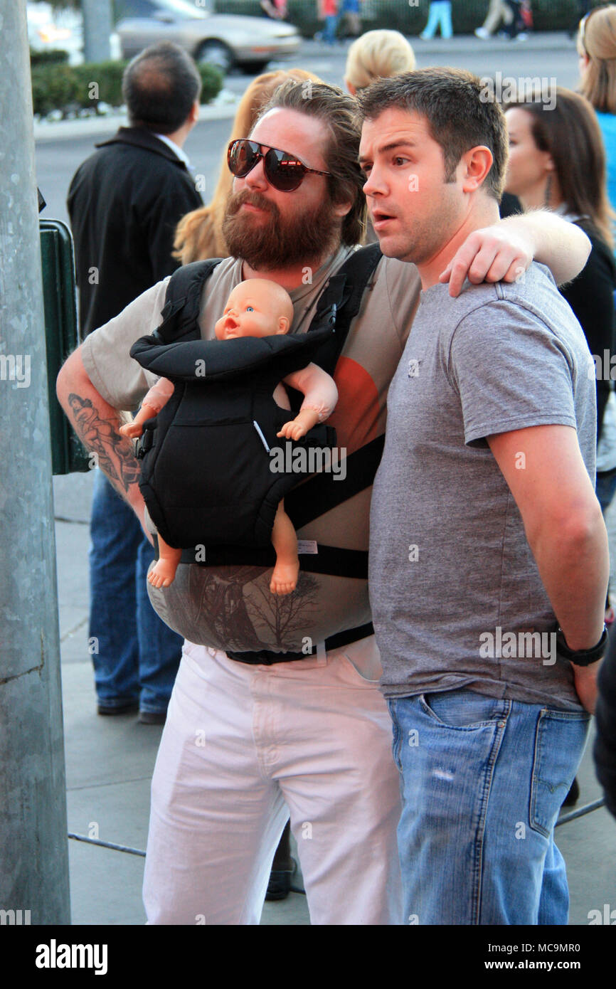 Actor looking alike Zach Galifianakis, who plays Alan Garner in the Hangover movies, posing with a tourist for a picture at the Las Vegas Strip, NV Stock Photo