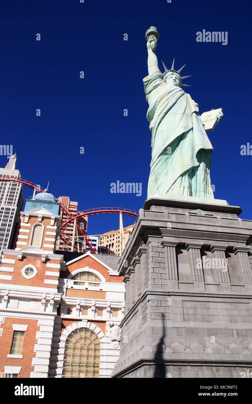 View of the Statue of Liberty replica in front of the artificial NYC skyline and the rollercoaster of the New York-New York, Las Vegas, NV, USA Stock Photo