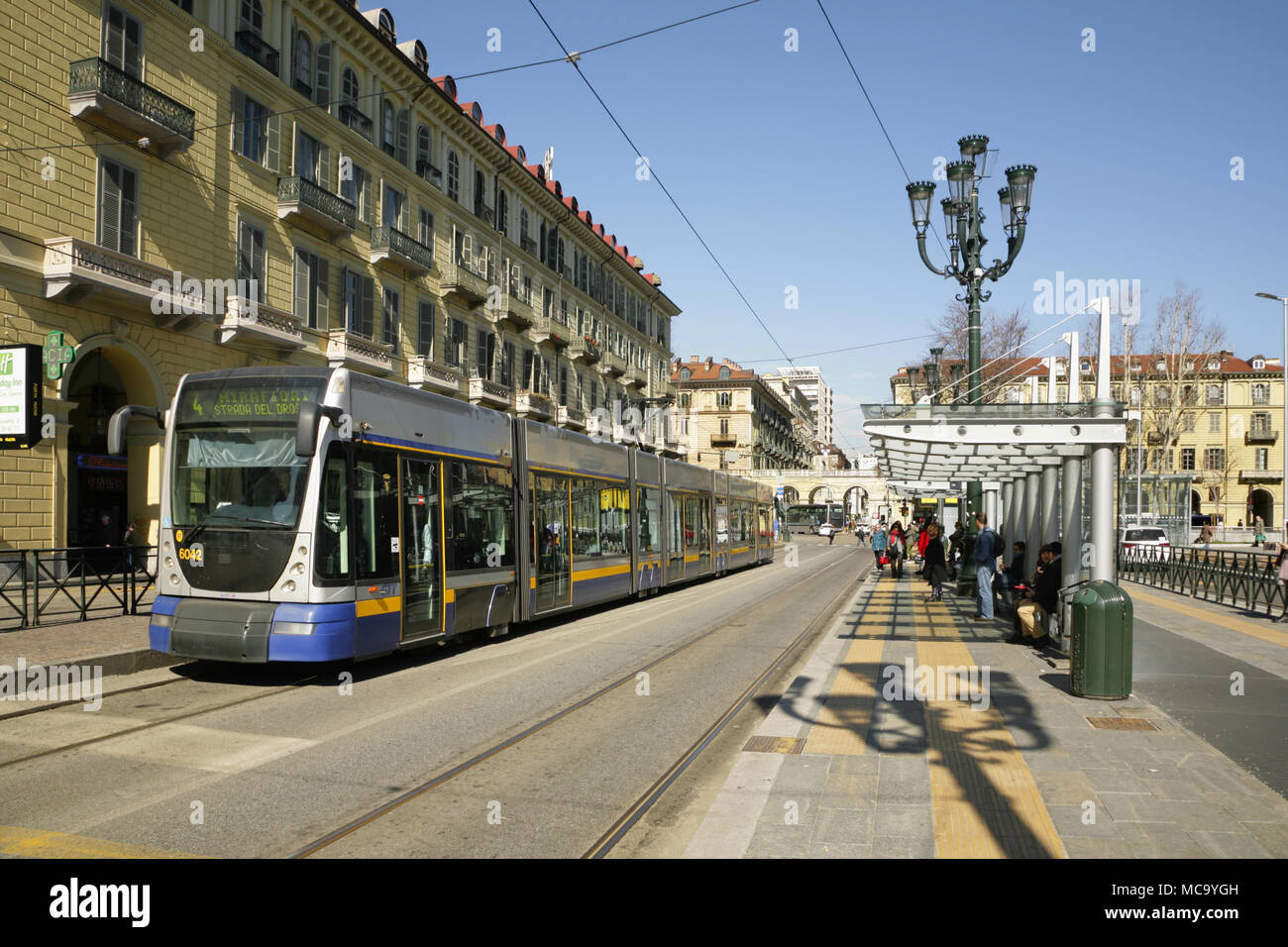 Tram at stop outside Turin Porta Nuova railway station, Italy Stock Photo -  Alamy