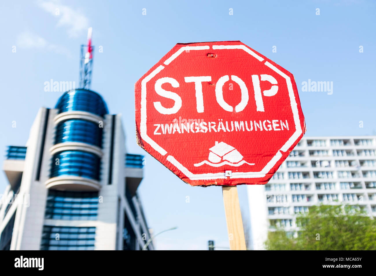 Berlin, Germany, 14 April 2018. 'STOP evictions' is written on a sign of a Demonstrant during the demonstration under the motto 'resist rental madness' in front of the SPD party central. More than 13,000 people demonstrated against 'repression and rent madness' in the capital. Credit: SOPA Images Limited/Alamy Live News Stock Photo