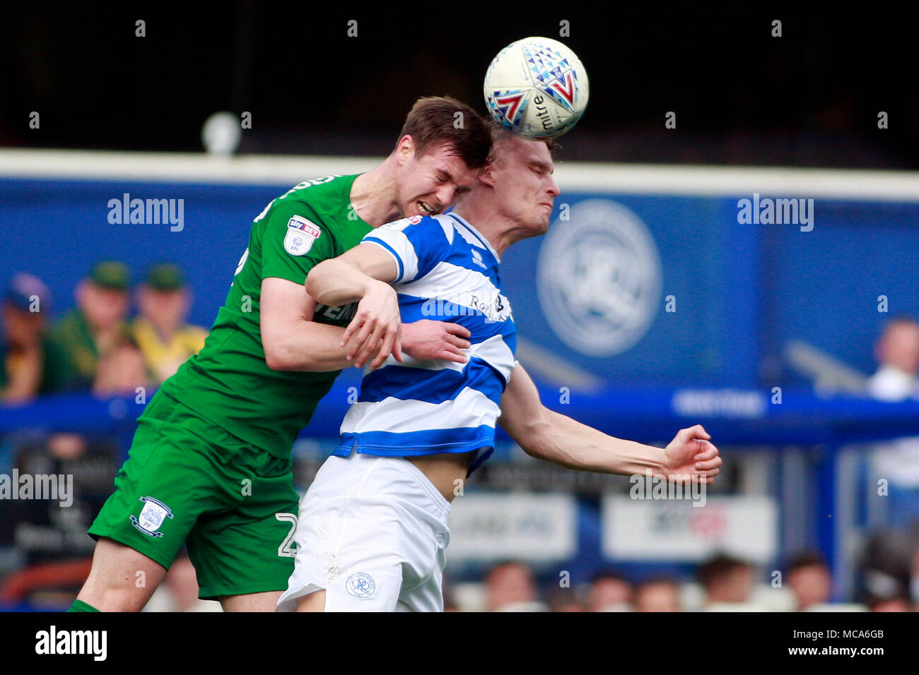 London, UK, 14 April 2018. Matt Smith of Queens Park Rangers (R) is fouled by Paul Huntington of Preston North End (L). EFL Skybet championship match, Queens Park Rangers v Preston North End at Loftus Road in London on Saturday 14th April 2018.  this image may only be used for Editorial purposes. Editorial use only, license required for commercial use. No use in betting, games or a single club/league/player publications. pic by Steffan Bowen/Andrew Orchard sports photography/Alamy Live news Credit: Andrew Orchard sports photography/Alamy Live News Stock Photo