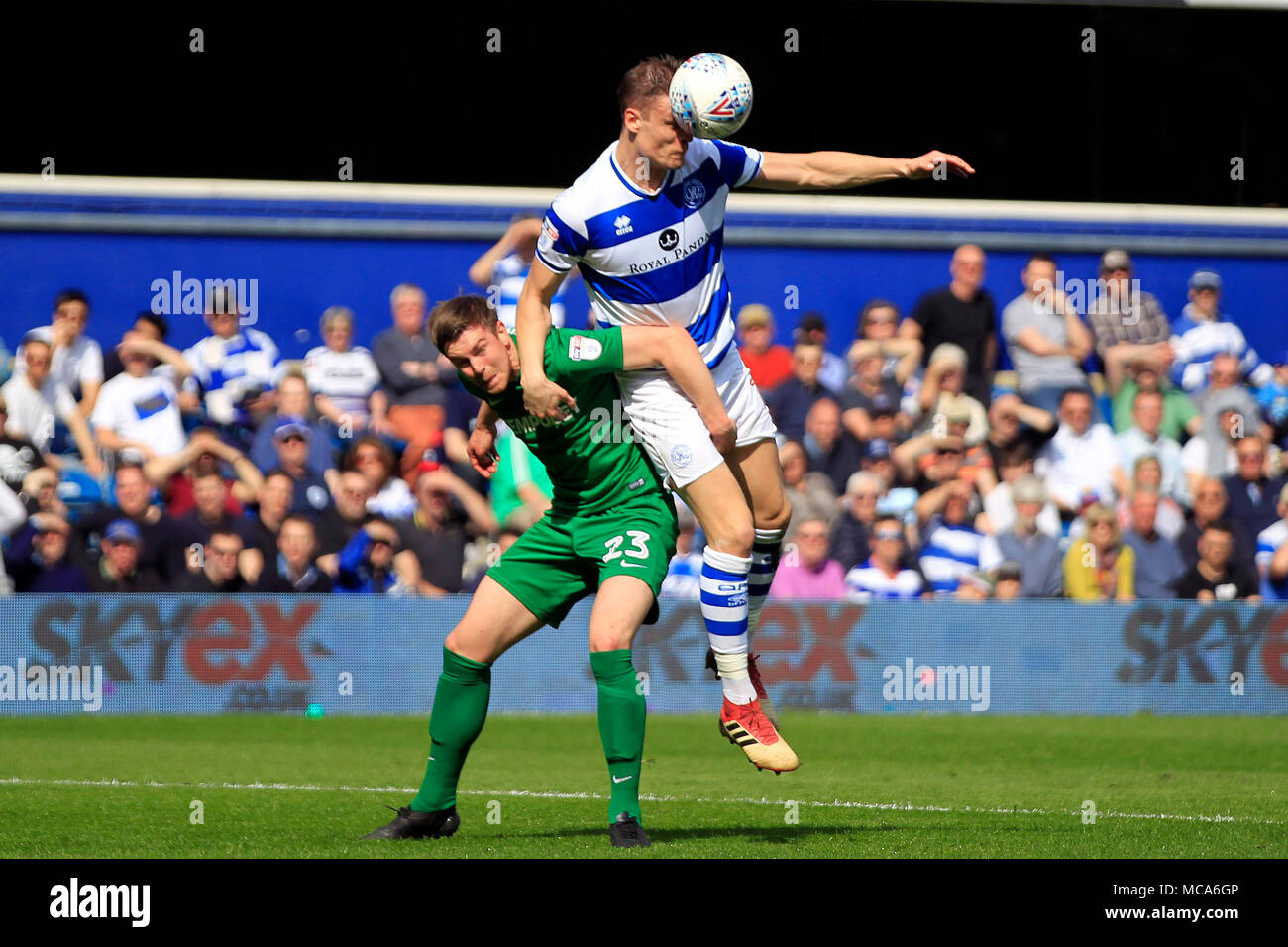 London, UK, 14 April 2018. Matt Smith of Queens Park Rangers (R) battles with Paul Huntington of Preston North End (L). EFL Skybet championship match, Queens Park Rangers v Preston North End at Loftus Road in London on Saturday 14th April 2018.  this image may only be used for Editorial purposes. Editorial use only, license required for commercial use. No use in betting, games or a single club/league/player publications. pic by Steffan Bowen/Andrew Orchard sports photography/Alamy Live news Credit: Andrew Orchard sports photography/Alamy Live News Stock Photo