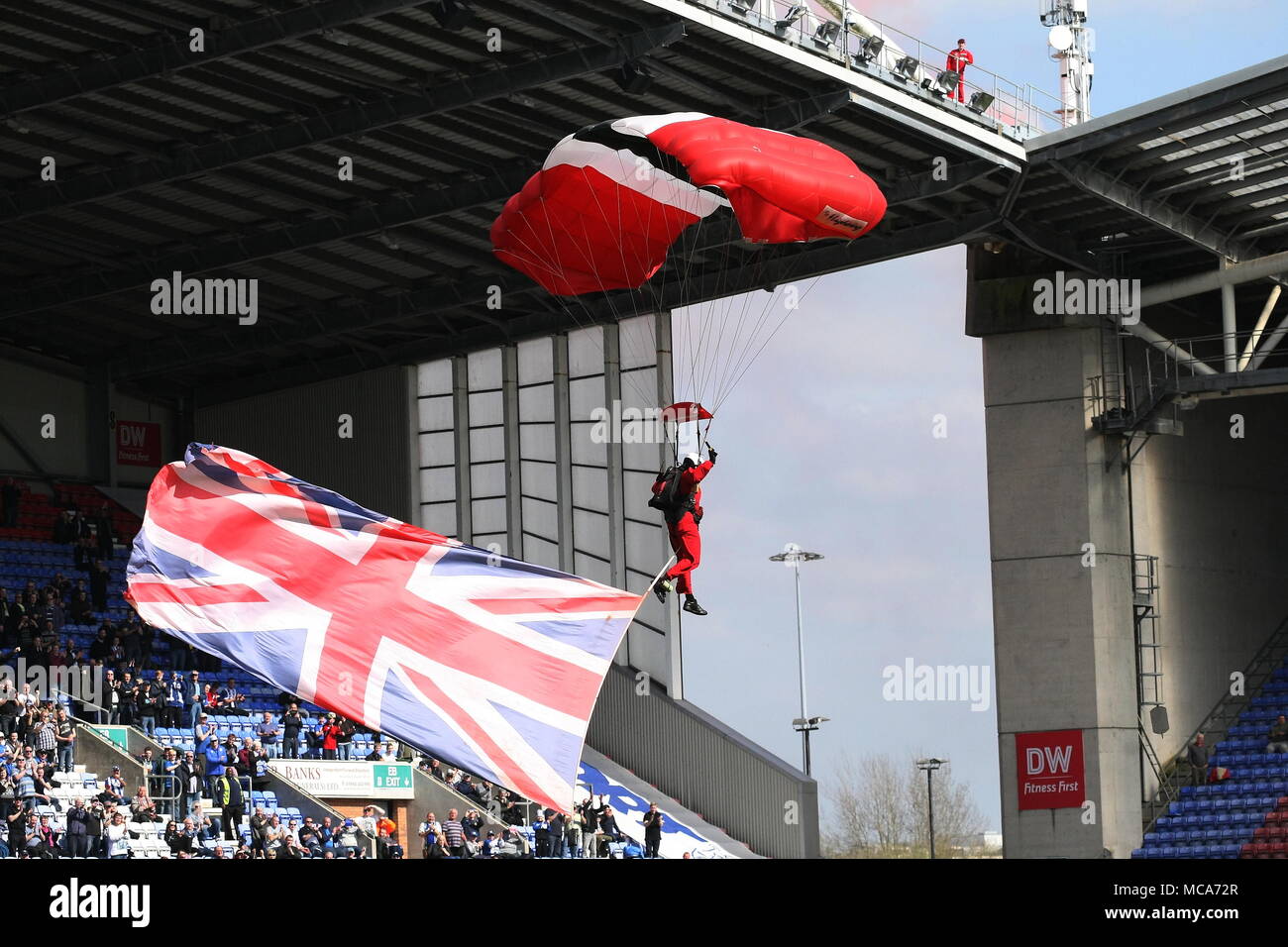Wigan, Greater Manchester, UK. 14th April, 2018. The Red Devils land on the pitch ahead of the Wigan Athletic v Rotherham United League One fixture at The DW Stadium. Credit: Simon Newbury/Alamy Live News Stock Photo