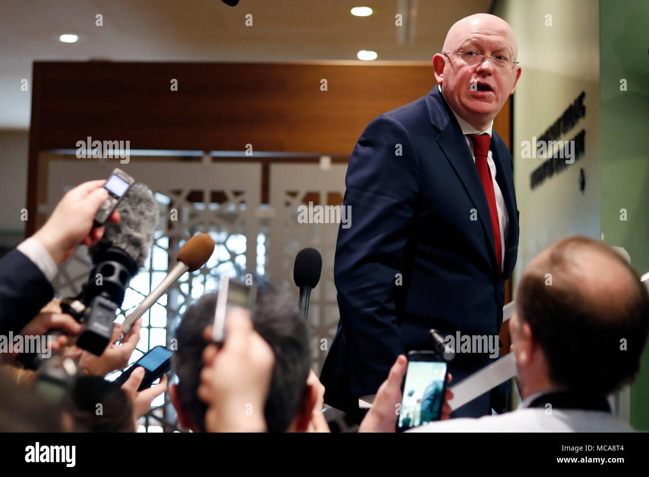 Untied Nations. 14th Apr, 2018. Russian Ambassador to the United Nations Vassily Nebenzia speaks to journalists after a Security Council emergency meeting on Syria at the UN headquarters in New York, April 14, 2018. A Russian-drafted resolution, which would have condemned the military strikes on Syria carried out by the United States, France and Britain, failed to be adopted by the Security Council. Credit: Li Muzi/Xinhua/Alamy Live News Stock Photo