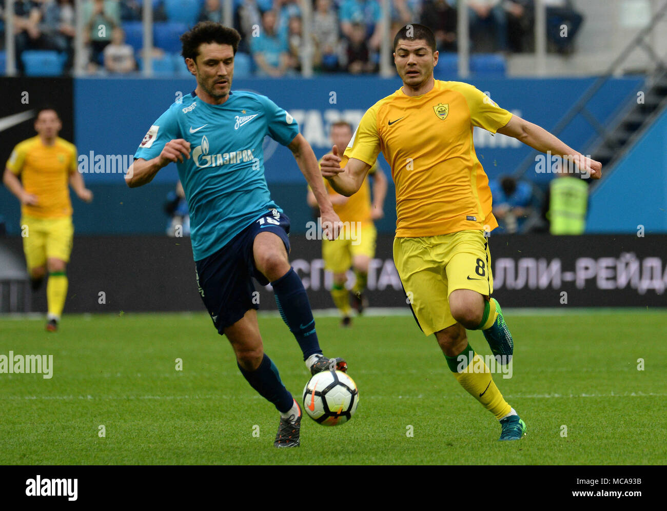 SÃO PETERSBURGO, MO - 14.04.2018: ZENIT X ANZHI - Russia. St. Petersburg. April 14, 2018. Players of ZENIT Yuri Zhirkov and ANZHI Arsen Hubulov (from left to right) in a match of the Russian Football Championship between the ZENIT team (St. Petersburg) and team of ANZHI (Makhachkala). (Photo: Andrey Pronin/Fotoarena) Credit: Foto Arena LTDA/Alamy Live News Stock Photo