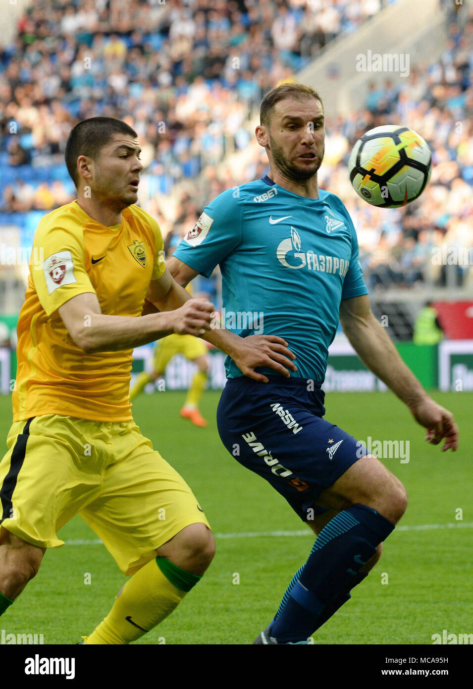 SÃO PETERSBURGO, MO - 14.04.2018: ZENIT X ANZHI - Russia. St. Petersburg. April 14, 2018. Players of ANZHI Arsen Hubulov and ZENIT Branislav Ivanovich (from left to right) in a match of the Russian Football Championship between the ZENIT team (St. Petersburg) and team of ANZHI (Makhachkala). (Photo: Andrey Pronin/Fotoarena) Credit: Foto Arena LTDA/Alamy Live News Stock Photo