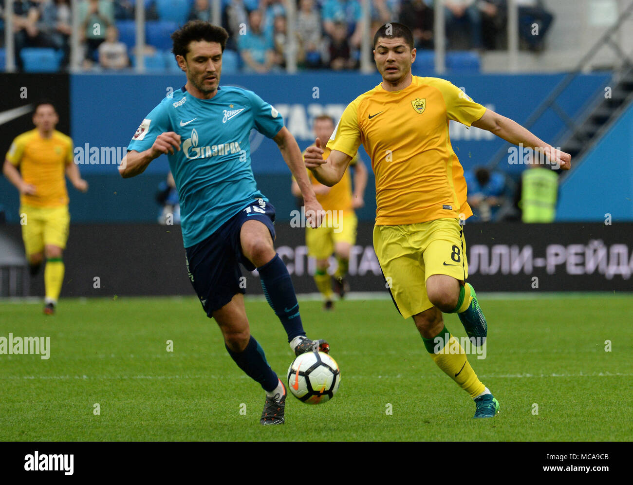 St. Petersburg, Russia. 14th Apr, 2018. Russia. St. Petersburg. April 14, 2018. Players of ZENIT Yuri Zhirkov and ANZHI Arsen Hubulov (from left to right) in a match of the Russian Football Championship between the ZENIT team (St. Petersburg) and team of ANZHI Credit: Andrey Pronin/ZUMA Wire/Alamy Live News Stock Photo